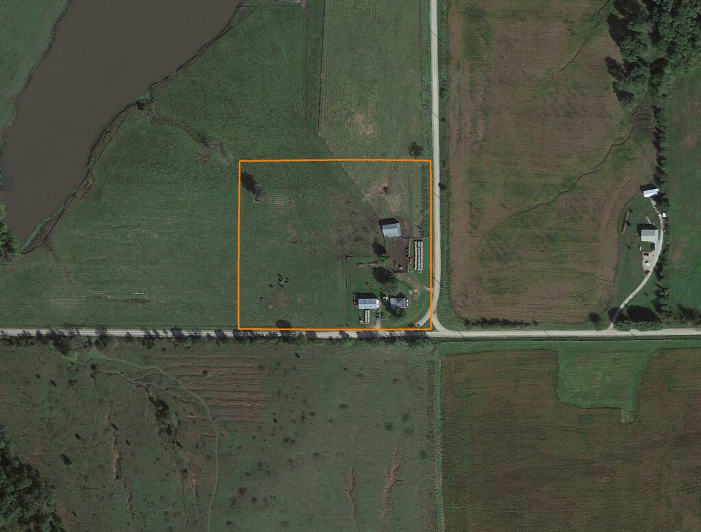 Newly Renovated Farmhouse and Pond on Acreage: Aerial View