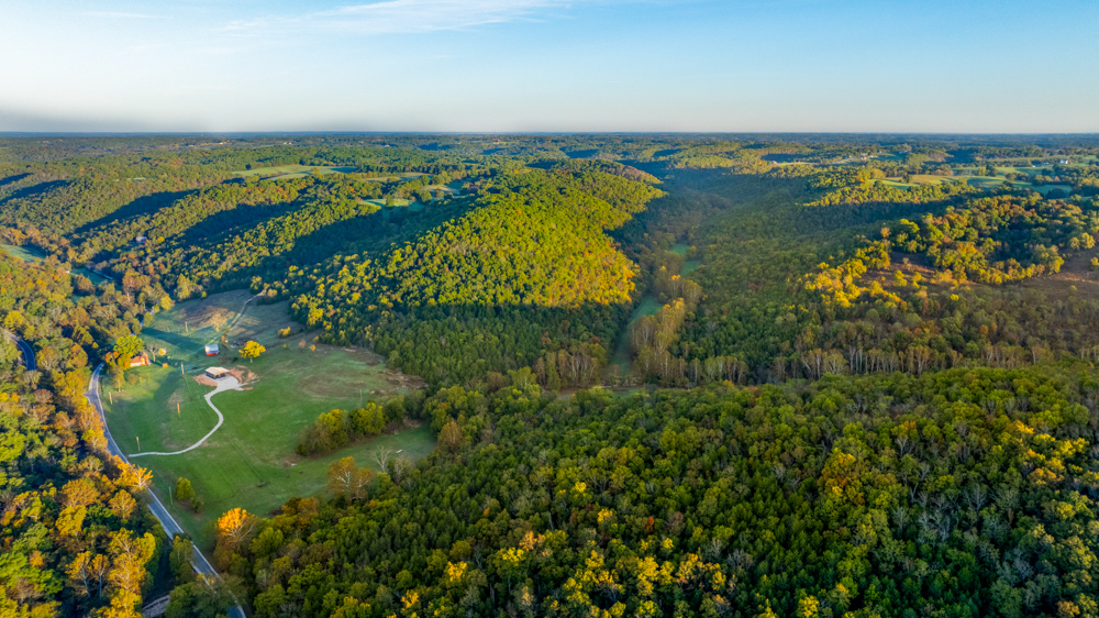 Turn-Key 160 Acres with Hurricane Creek, Timbered Ridges, and Pastureland