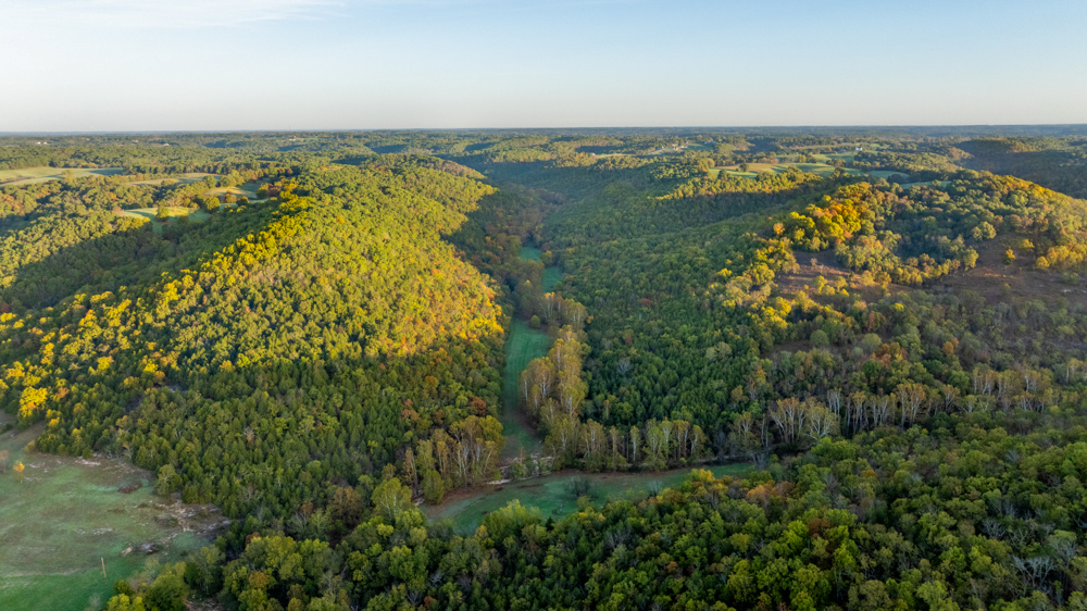 Turn-Key 160 Acres with Hurricane Creek, Timbered Ridges, and Pastureland