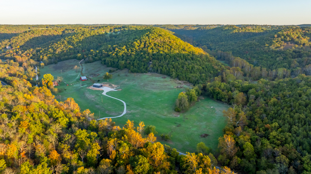 Turn-Key 160 Acres with Hurricane Creek, Timbered Ridges, and Pastureland