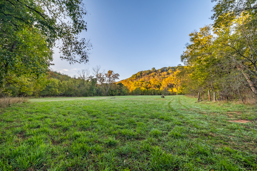Turn-Key 160 Acres with Hurricane Creek, Timbered Ridges, and Pastureland