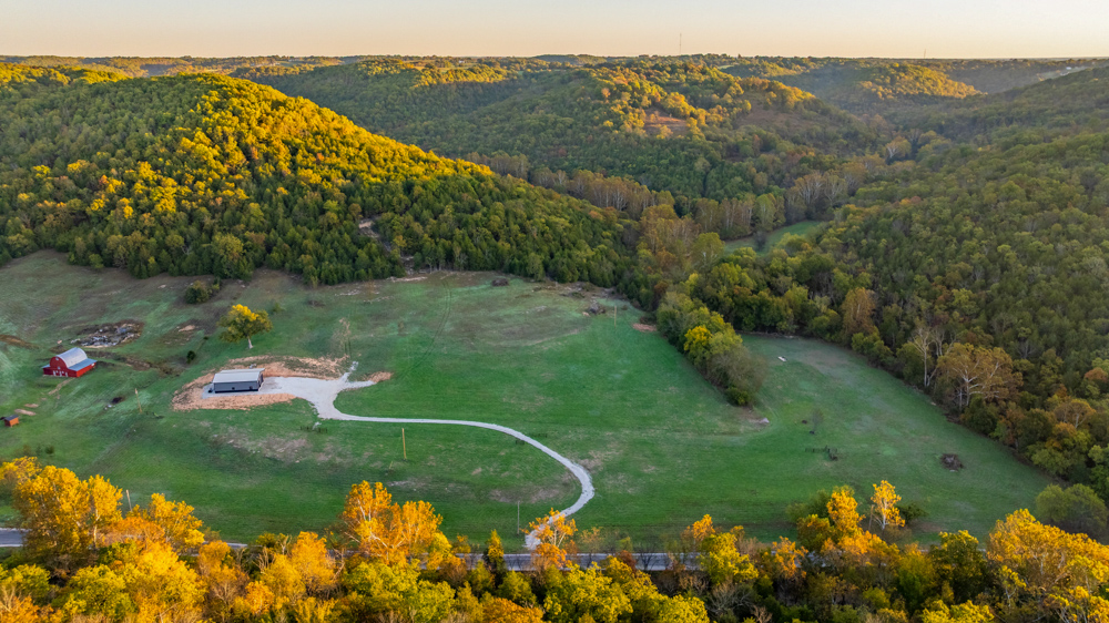 Turn-Key 160 Acres with Hurricane Creek, Timbered Ridges, and Pastureland