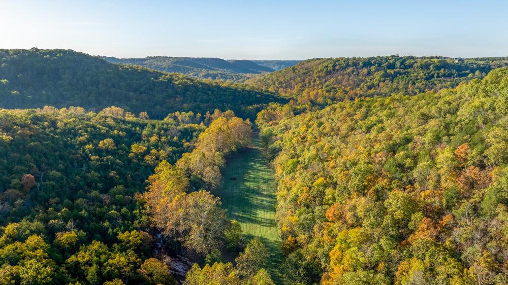 Turn-Key 160 Acres with Hurricane Creek, Timbered Ridges, and Pastureland