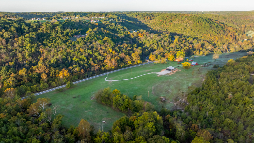 Turn-Key 160 Acres with Hurricane Creek, Timbered Ridges, and Pastureland