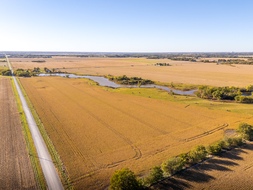 Coffey 61 - Oil Income, 8 Acre Pond, Big Shop & Home with Unlimited Potential