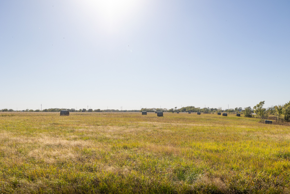 Coffey 61 - Oil Income, 8 Acre Pond, Big Shop & Home with Unlimited Potential