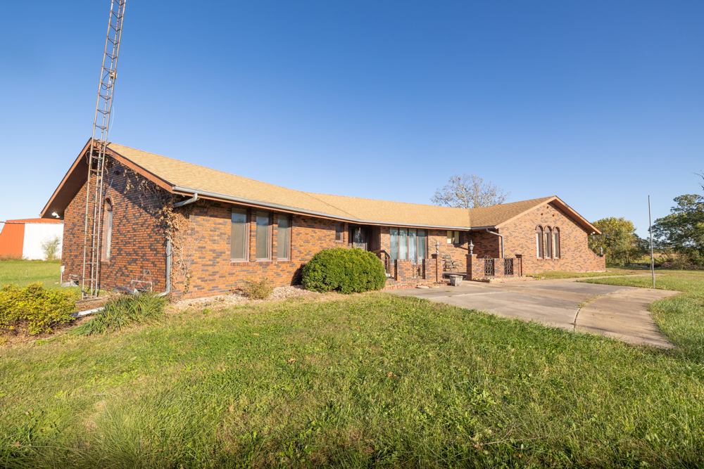 Coffey 61 - Oil Income, 8 Acre Pond, Big Shop & Home with Unlimited Potential