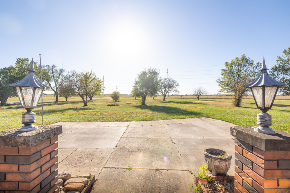 Coffey 61 - Oil Income, 8 Acre Pond, Big Shop & Home with Unlimited Potential