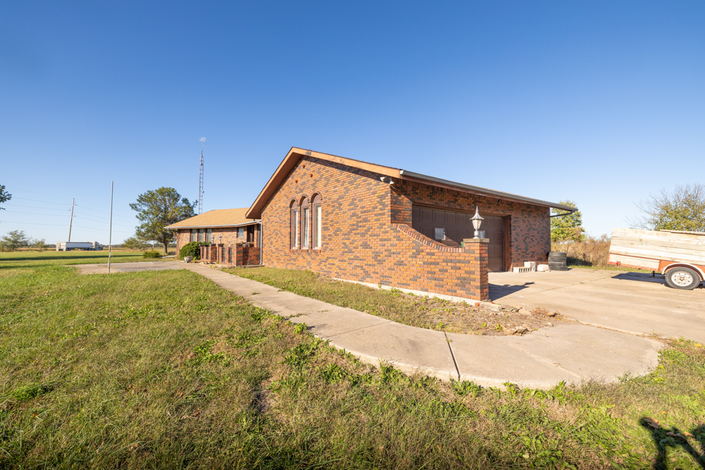 Coffey 61 - Oil Income, 8 Acre Pond, Big Shop & Home with Unlimited Potential