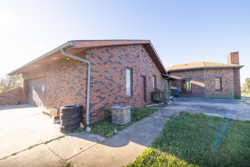 Coffey 61 - Oil Income, 8 Acre Pond, Big Shop & Home with Unlimited Potential