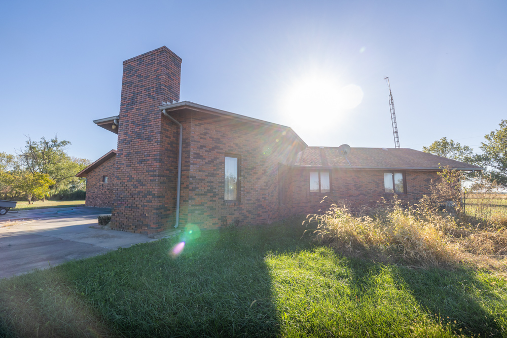 Coffey 61 - Oil Income, 8 Acre Pond, Big Shop & Home with Unlimited Potential