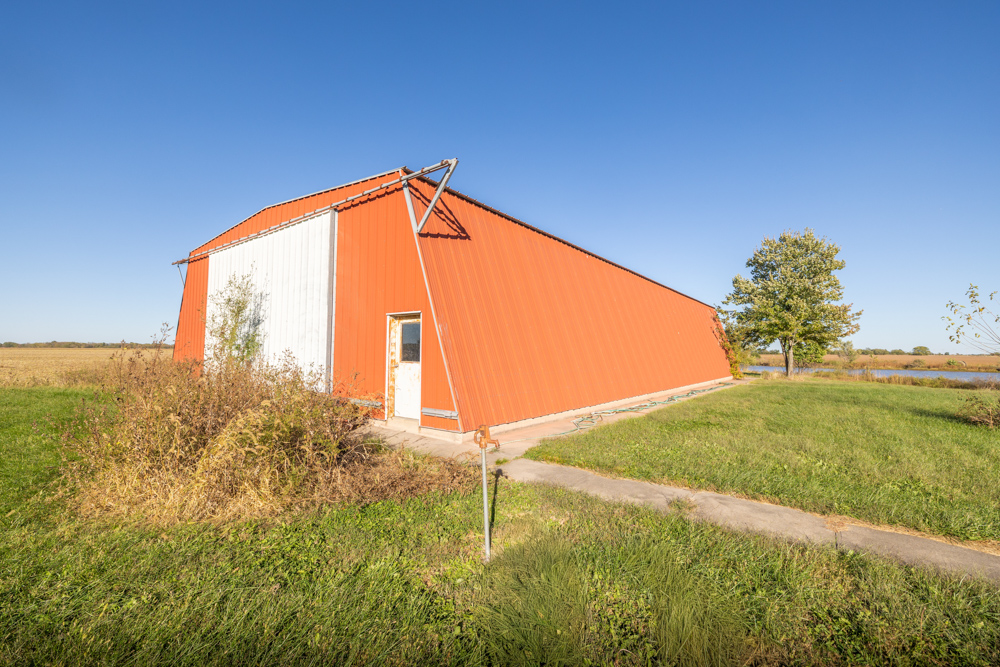 Coffey 61 - Oil Income, 8 Acre Pond, Big Shop & Home with Unlimited Potential
