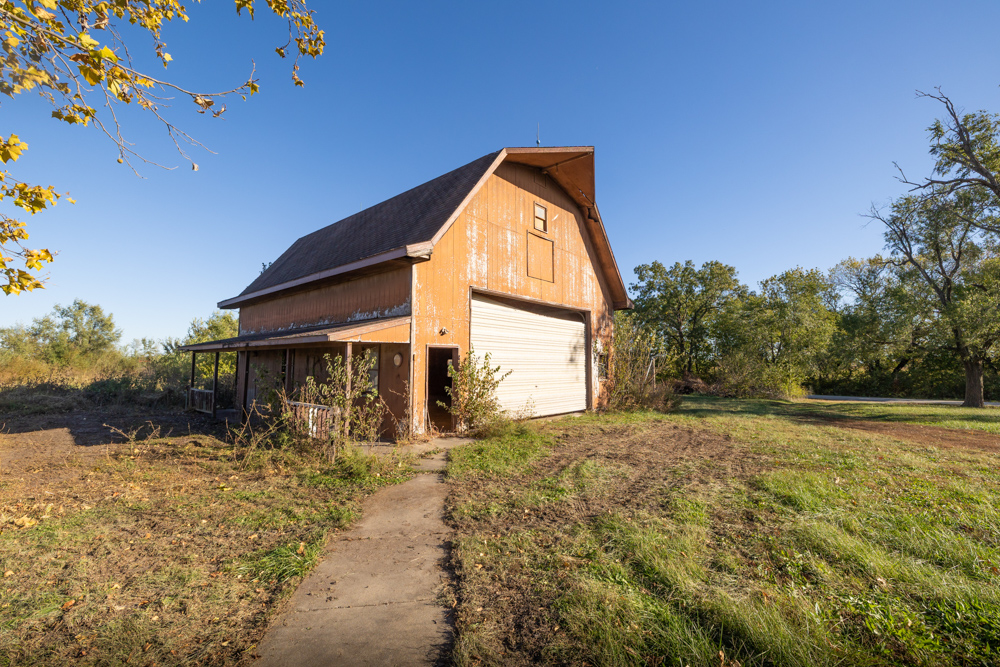 Coffey 61 - Oil Income, 8 Acre Pond, Big Shop & Home with Unlimited Potential