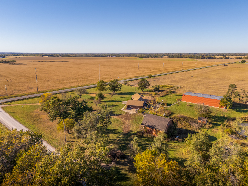 Coffey 61 - Oil Income, 8 Acre Pond, Big Shop & Home with Unlimited Potential