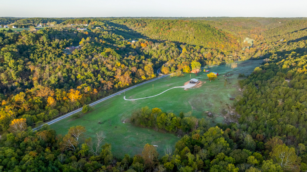 Turn-Key 160 Acres with Hurricane Creek, Timbered Ridges, and Pastureland
