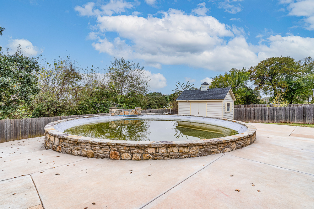 Beautiful 4 Bedroom Brick Home with Office, Pool, and Hot Tub