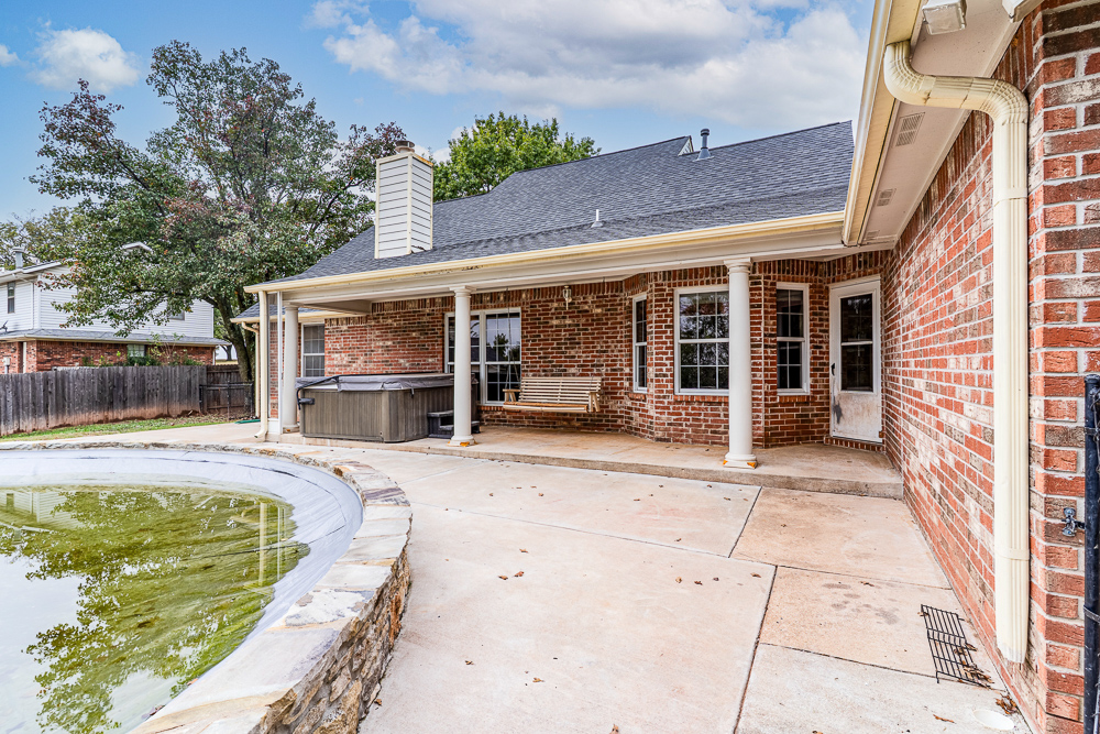 Beautiful 4 Bedroom Brick Home with Office, Pool, and Hot Tub
