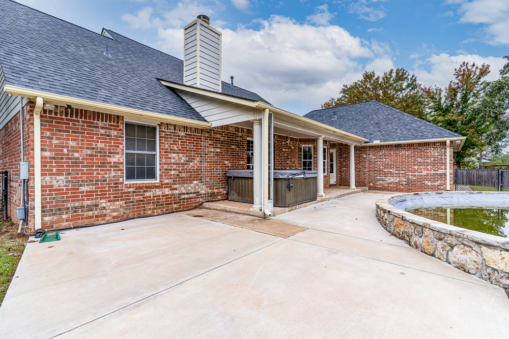 Beautiful 4 Bedroom Brick Home with Office, Pool, and Hot Tub
