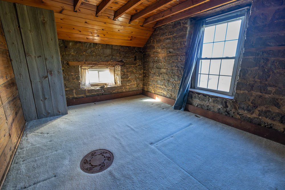 Stunning Hunting Acreage with Rustic Limestone Home