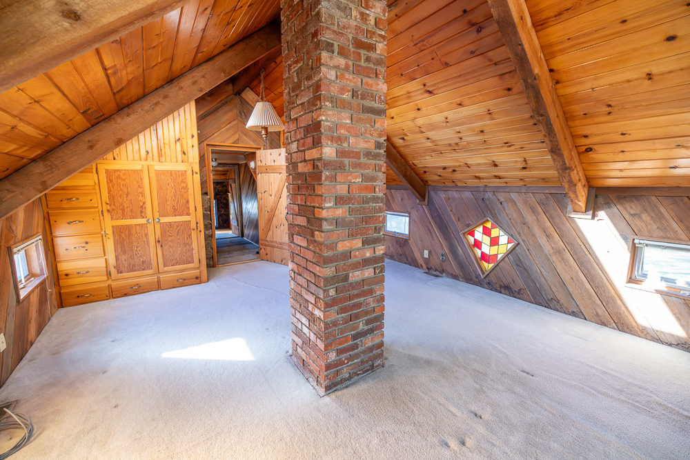 Stunning Hunting Acreage with Rustic Limestone Home