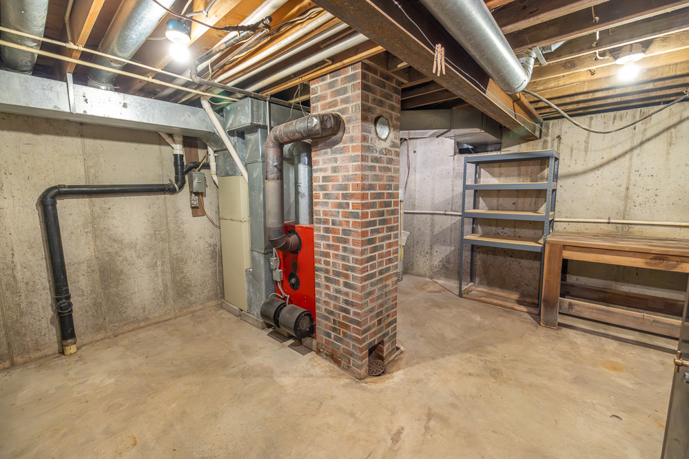 Stunning Hunting Acreage with Rustic Limestone Home