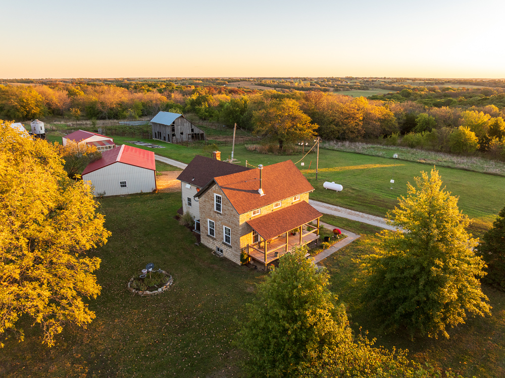 Stunning Hunting Acreage with Rustic Limestone Home