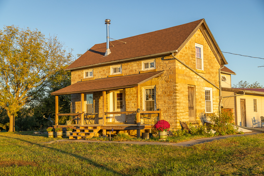 Stunning Hunting Acreage with Rustic Limestone Home