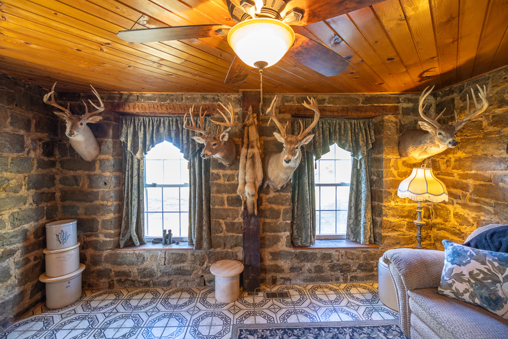 Stunning Hunting Acreage with Rustic Limestone Home