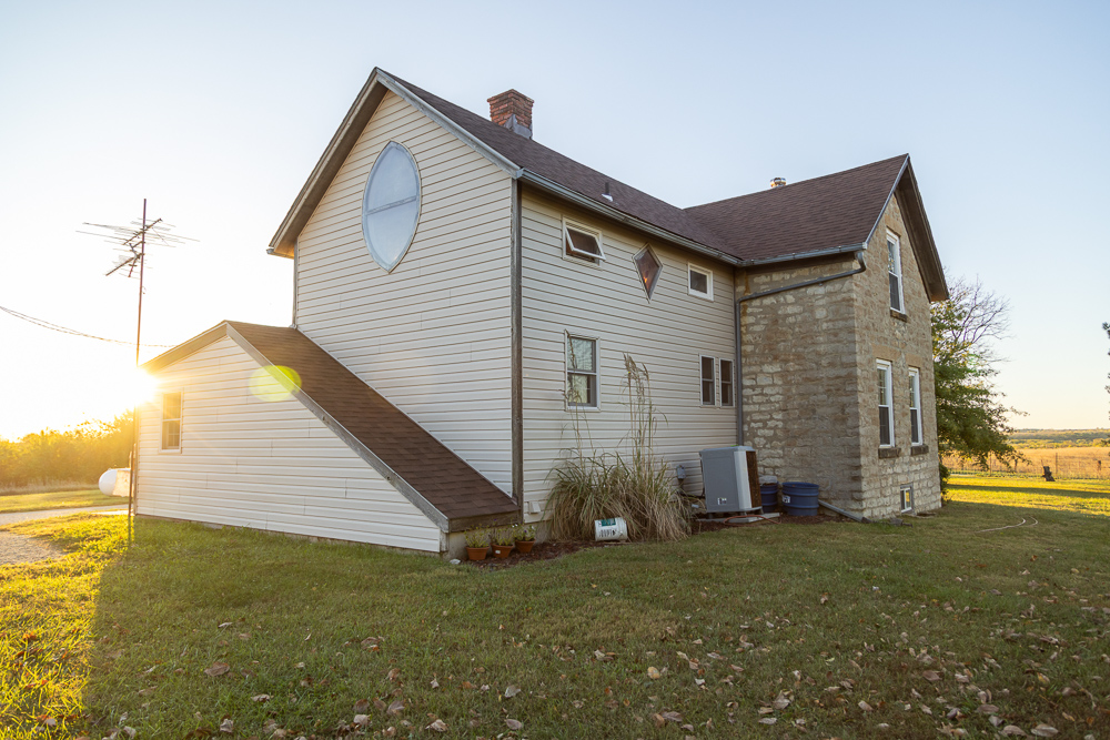 Stunning Hunting Acreage with Rustic Limestone Home