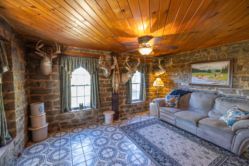 Stunning Hunting Acreage with Rustic Limestone Home