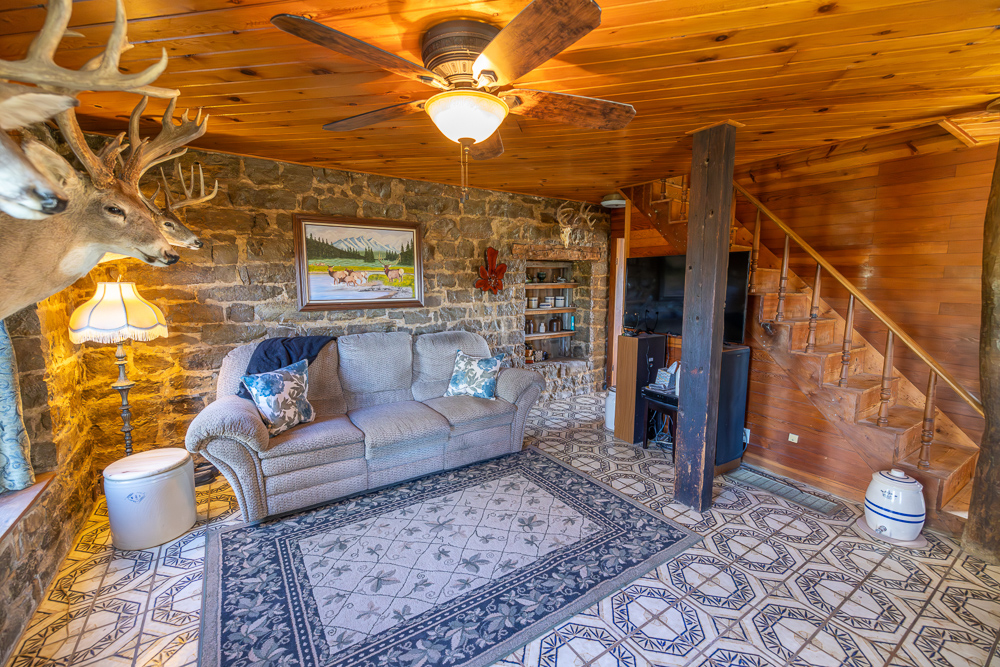 Stunning Hunting Acreage with Rustic Limestone Home