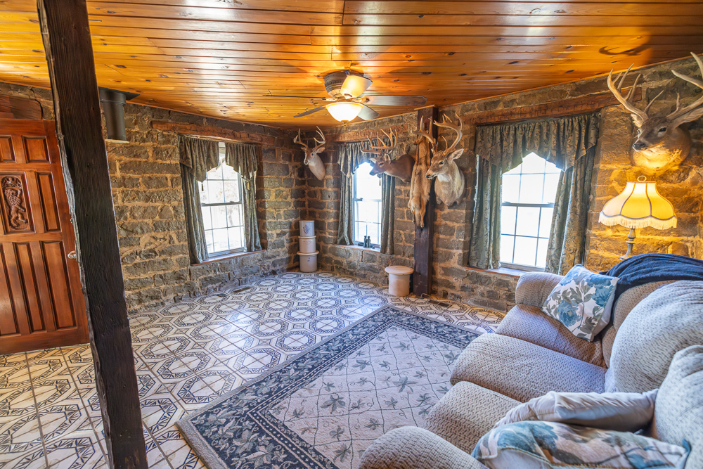 Stunning Hunting Acreage with Rustic Limestone Home