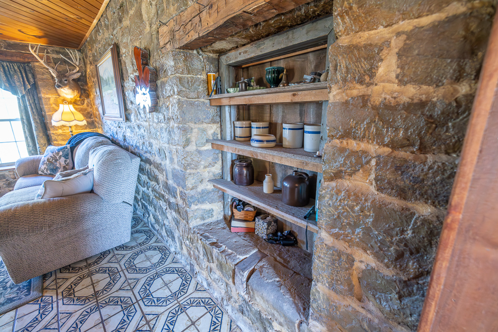 Stunning Hunting Acreage with Rustic Limestone Home