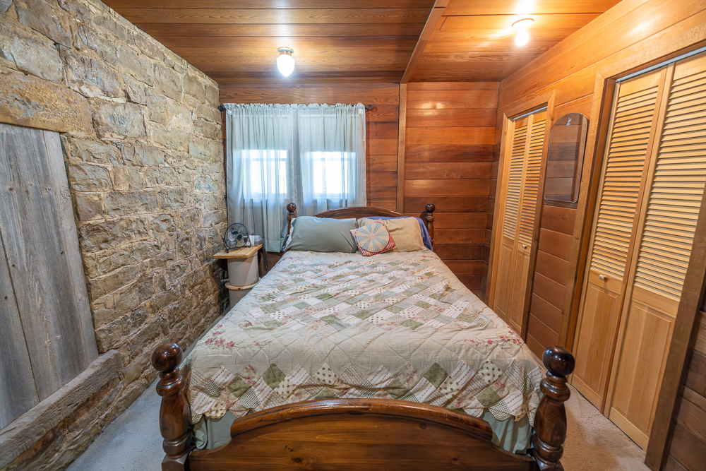 Stunning Hunting Acreage with Rustic Limestone Home