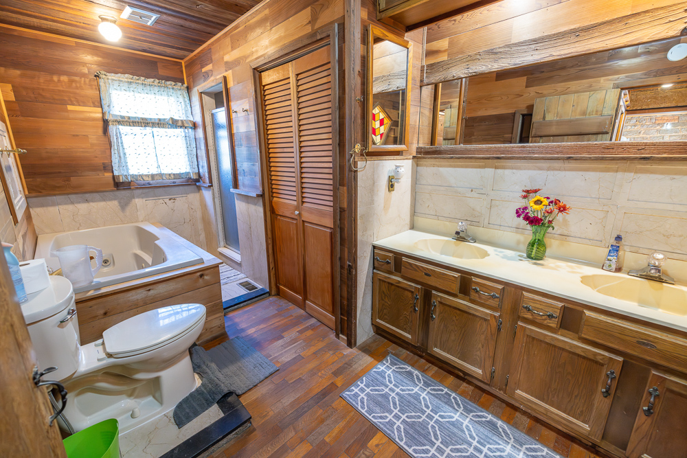 Stunning Hunting Acreage with Rustic Limestone Home