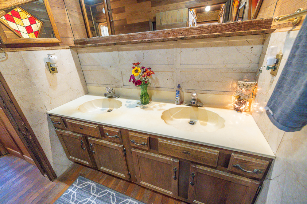 Stunning Hunting Acreage with Rustic Limestone Home