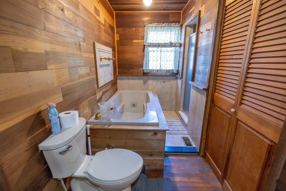 Stunning Hunting Acreage with Rustic Limestone Home