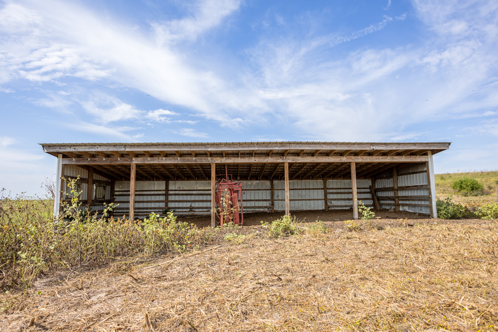 Sprawling Century Farm and Ranch with Pastures, Ponds, Hay Fields, Barns and a Home