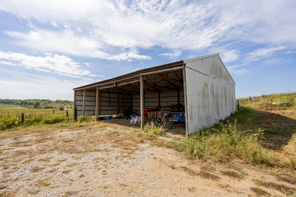 Sprawling Century Farm and Ranch with Pastures, Ponds, Hay Fields, Barns and a Home