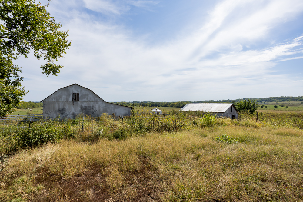 Sprawling Century Farm and Ranch with Pastures, Ponds, Hay Fields, Barns and a Home