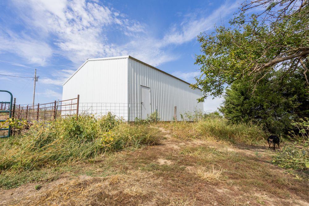 Sprawling Century Farm and Ranch with Pastures, Ponds, Hay Fields, Barns and a Home
