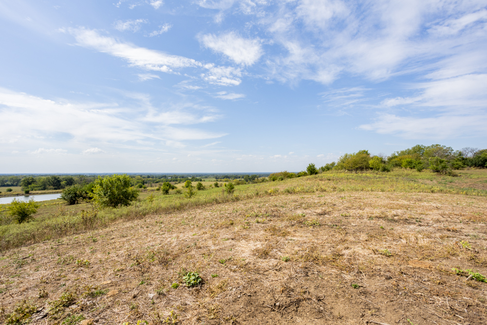 Sprawling Century Farm and Ranch with Pastures, Ponds, Hay Fields, Barns and a Home