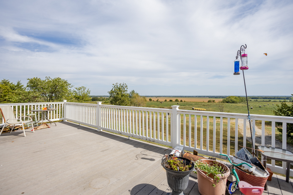 Sprawling Century Farm and Ranch with Pastures, Ponds, Hay Fields, Barns and a Home