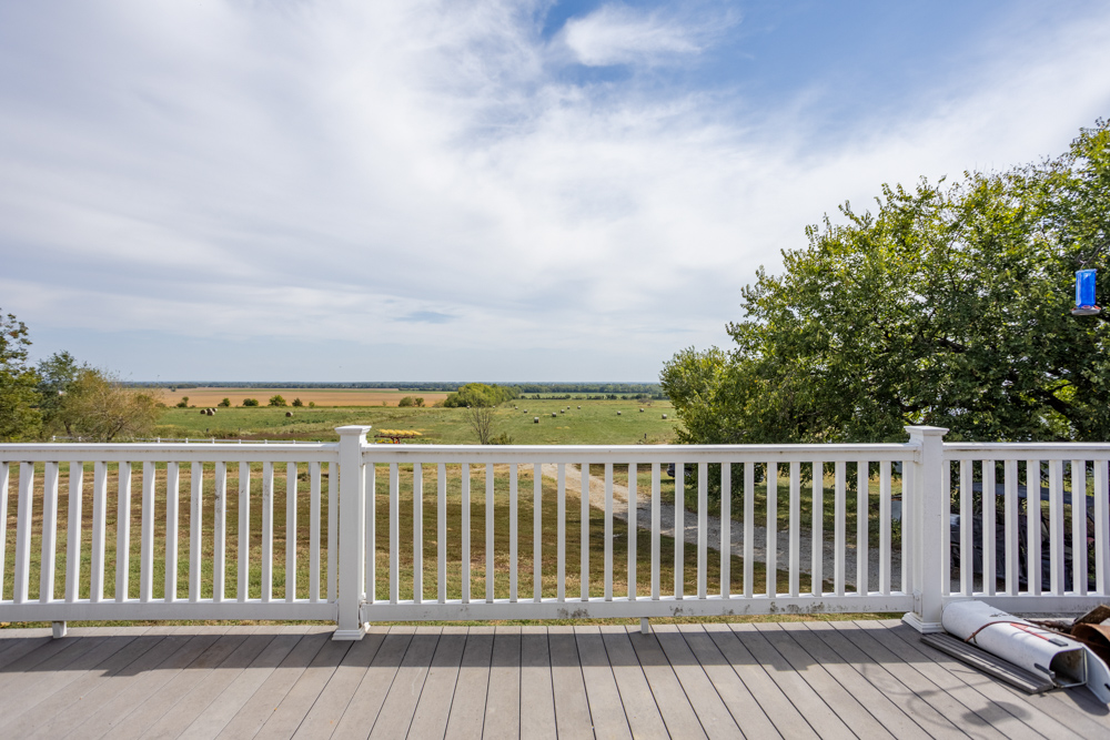 Sprawling Century Farm and Ranch with Pastures, Ponds, Hay Fields, Barns and a Home
