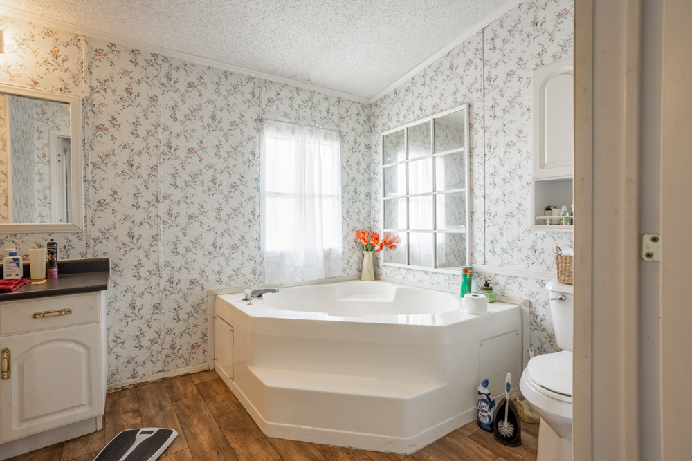 Sprawling Century Farm and Ranch with Pastures, Ponds, Hay Fields, Barns and a Home