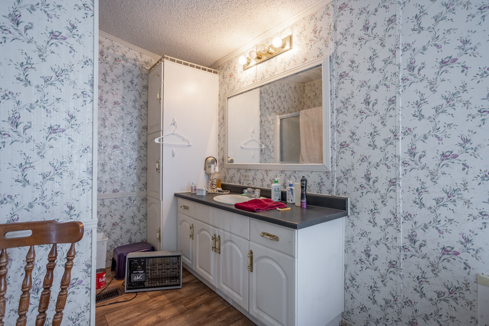 Sprawling Century Farm and Ranch with Pastures, Ponds, Hay Fields, Barns and a Home