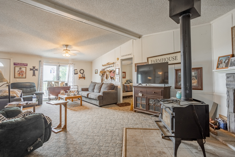 Sprawling Century Farm and Ranch with Pastures, Ponds, Hay Fields, Barns and a Home