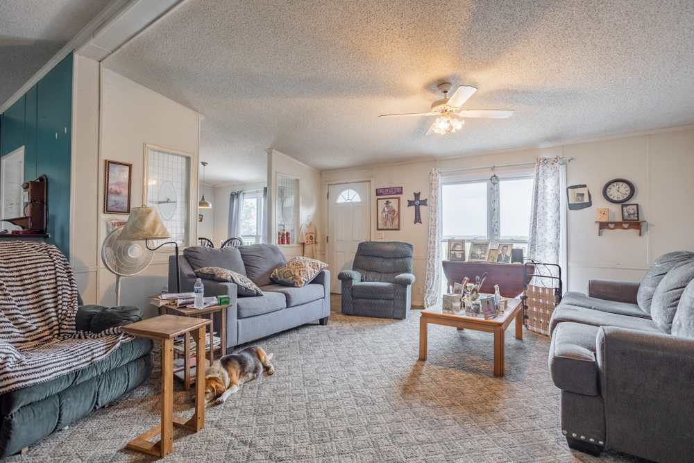 Sprawling Century Farm and Ranch with Pastures, Ponds, Hay Fields, Barns and a Home