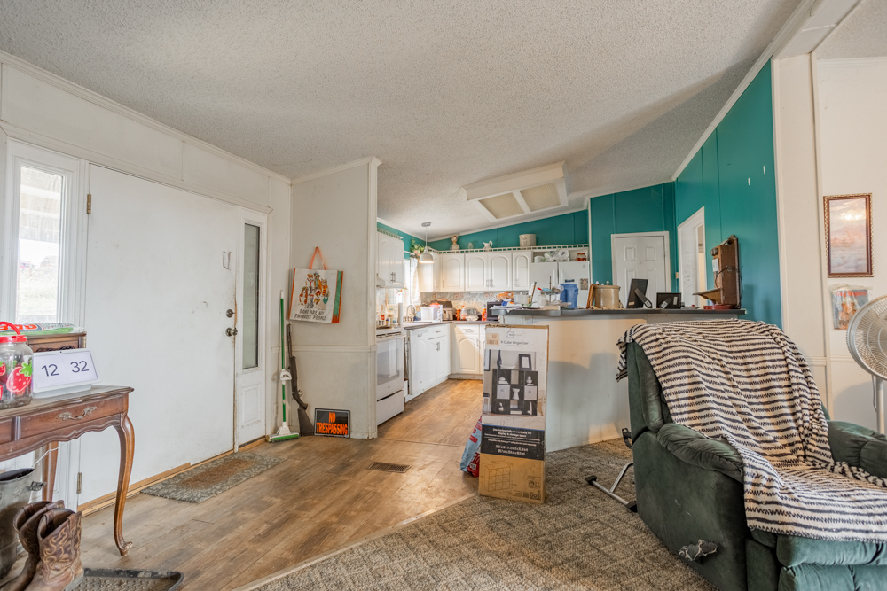 Sprawling Century Farm and Ranch with Pastures, Ponds, Hay Fields, Barns and a Home