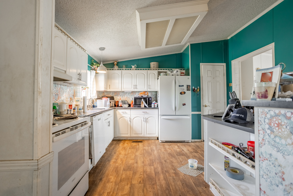 Sprawling Century Farm and Ranch with Pastures, Ponds, Hay Fields, Barns and a Home